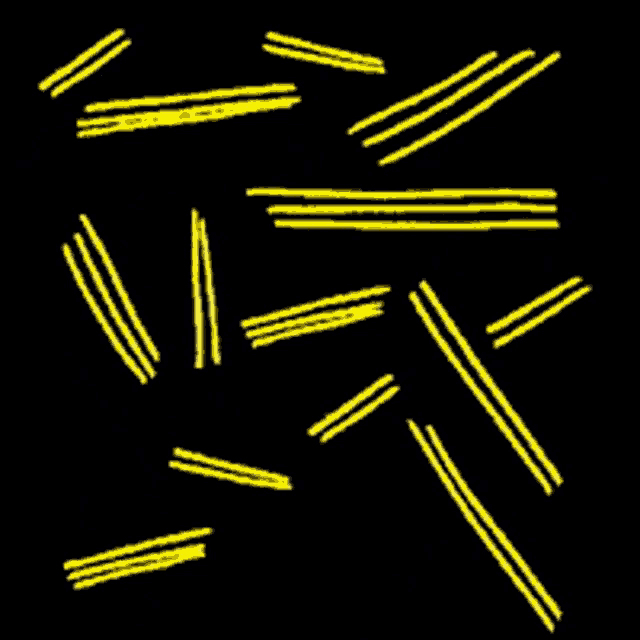 a bunch of yellow lines on a black background that look like spaghetti