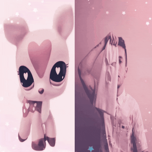 a stuffed animal with a heart on its face next to a man