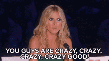 a woman is sitting in front of a microphone and saying `` you guys are crazy , crazy , crazy , crazy good  ''