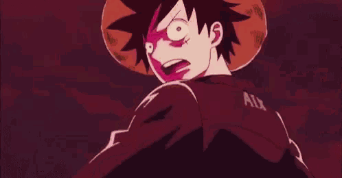 monkey d luffy from one piece is holding a beam of light in his hand while wearing a cowboy hat .