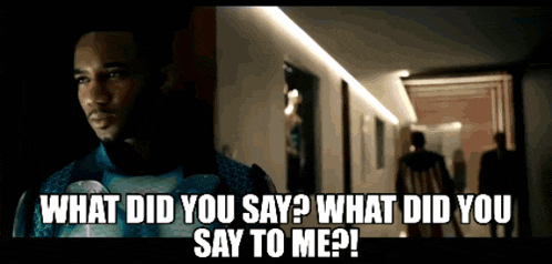a man in a superhero costume says " what did you say "