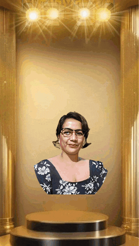 a statue of a woman wearing glasses and a blue top