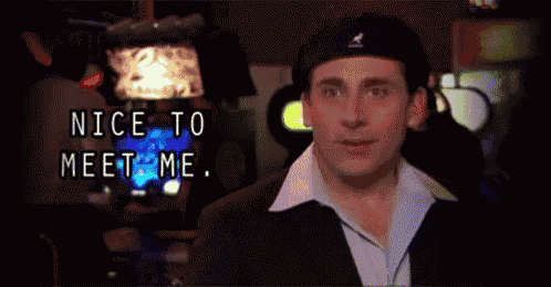 a man in a beret says nice to meet me in a dark room