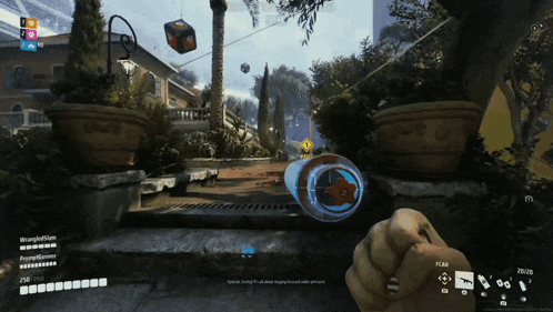 a screenshot of a video game shows a player 's hand holding a blue object with a star on it