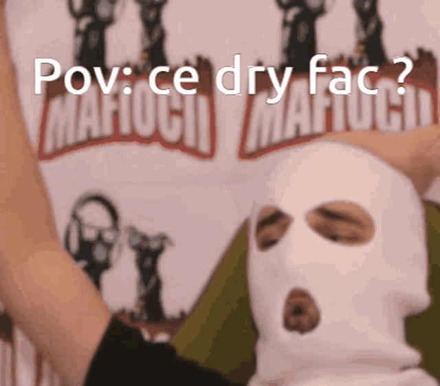 a man wearing a ski mask with the words " pov ce dry fac " written above him