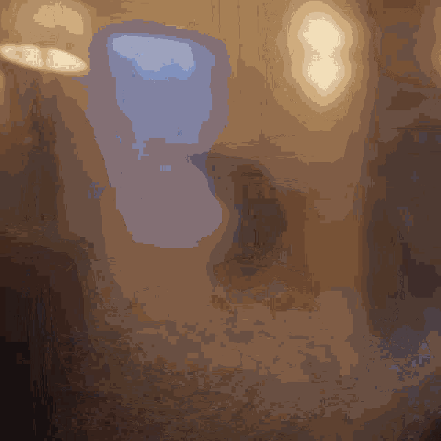 a blurred image of a room with a few lights