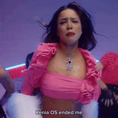 a woman in a pink top with the words kenia os ended me on the bottom