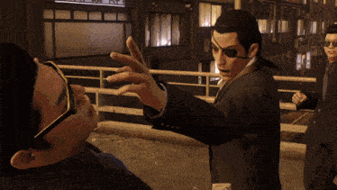 a man in a suit with an eye patch on his eye