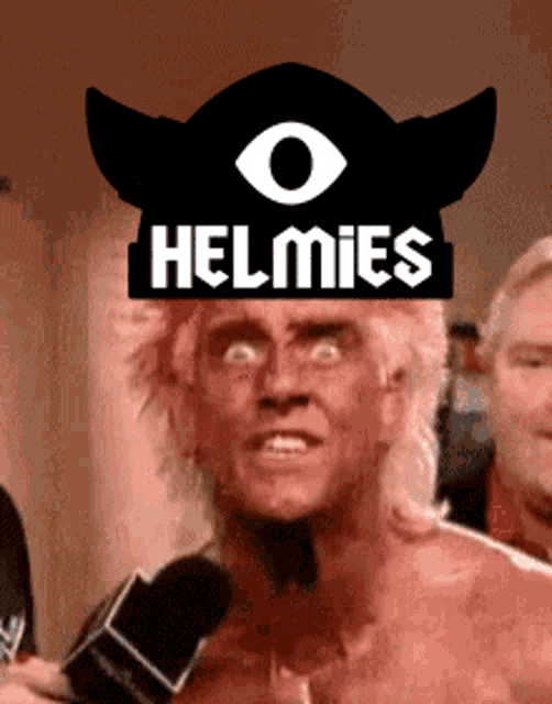 a man wearing a helmet with the word helmies on it