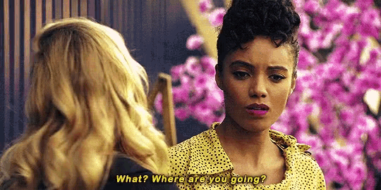 two women are standing next to each other and one of them is asking the other what where are you going ?