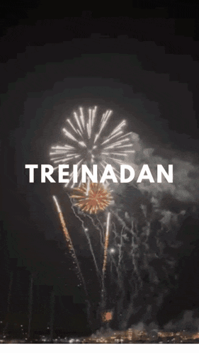 a fireworks display with the word treinadan in white