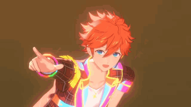 a boy with orange hair and blue eyes is pointing at the camera