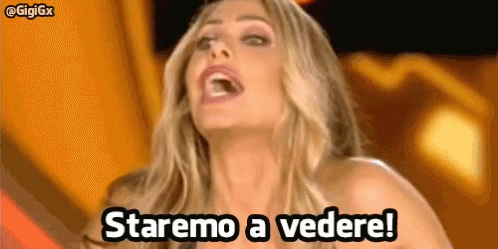 a close up of a woman 's face with the words staremo a vedere written below her