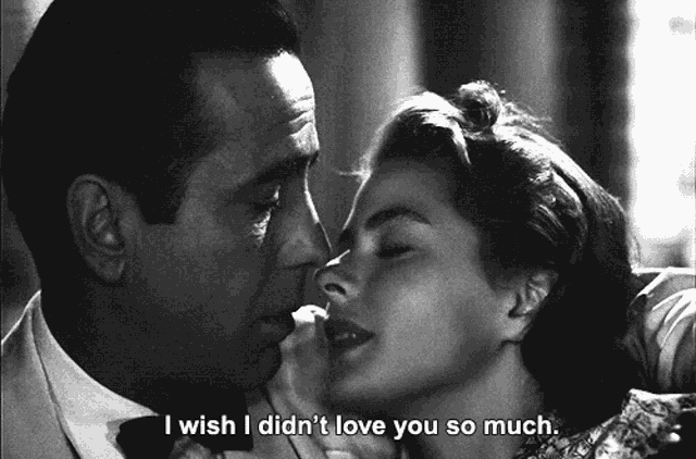 a black and white photo of a man kissing a woman with the caption i wish i didn 't love you so much