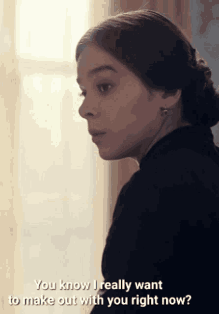a woman in a black dress says " you know i really want to make out with you right now ? "