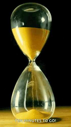 a hourglass with the words " ten minutes to go " on the bottom