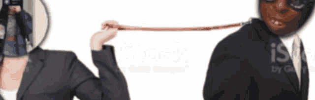 a man in a suit is tied to a woman 's neck