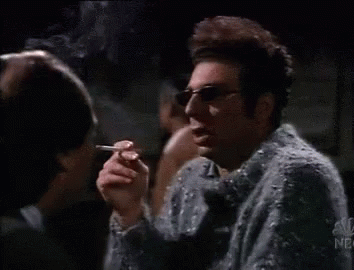Kramer Smoking GIF - Kramer Burp Beer GIFs