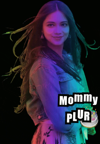 a woman in a denim jacket stands in front of a black background with the words mommy plur on it