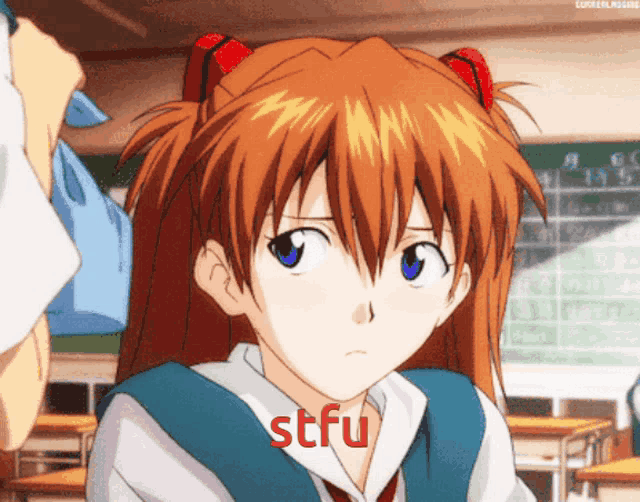 a girl with red hair and blue eyes says stfu in red letters