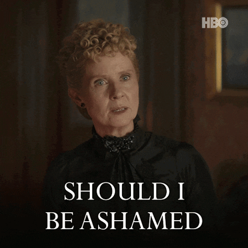 a woman in a black dress says " should i be ashamed "