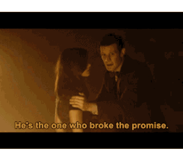 a man and a woman are hugging with the words he 's the one who broke the promise
