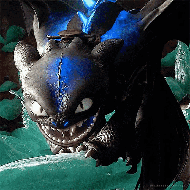 toothless from how to train your dragon is smiling and looking at the camera with a blue light behind him