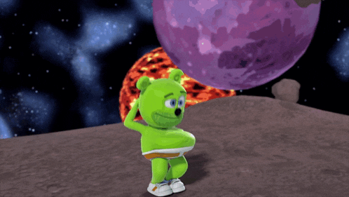 a green gummy bear is standing on a planet in space