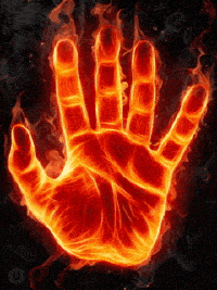 a hand is covered in flames and looks like it 's on fire