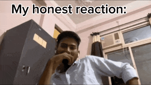 a man talking into a microphone with the words my honest reaction