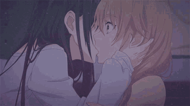 two anime girls kissing each other on the cheek