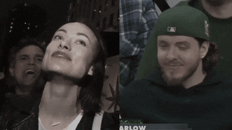 a black and white photo of a woman and a man with the word arrow on the bottom