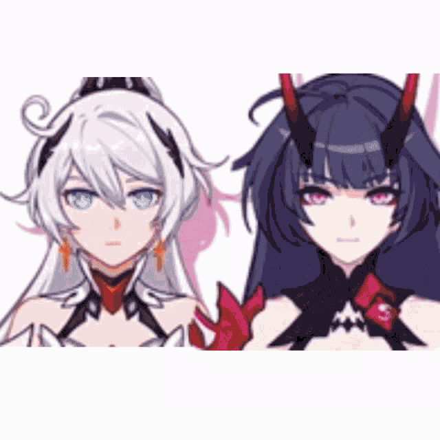a couple of anime girls standing next to each other .