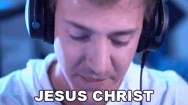 a man wearing headphones with the words jesus christ written on the bottom