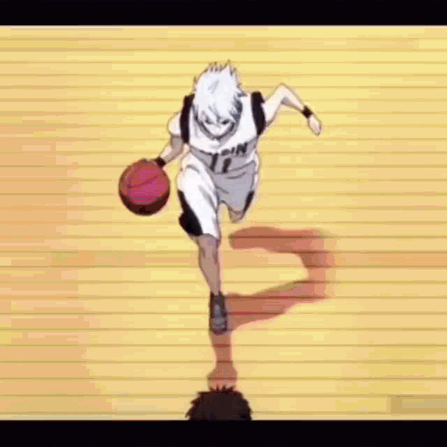 a basketball player in a blue jersey with the number 10 on it is jumping in the air while playing basketball .