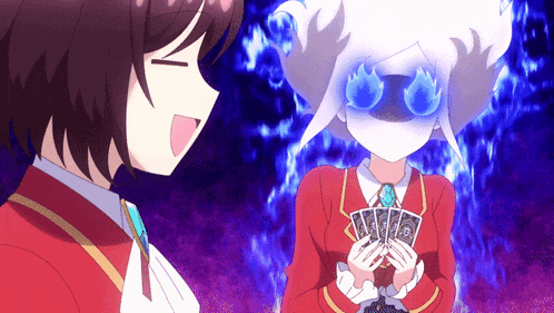 a girl in a red suit is holding a deck of playing cards in front of her face