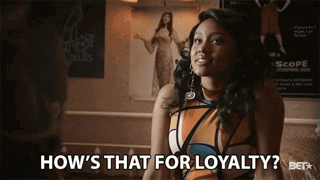 a woman says how 's that for loyalty in front of a lady sings the blues sign