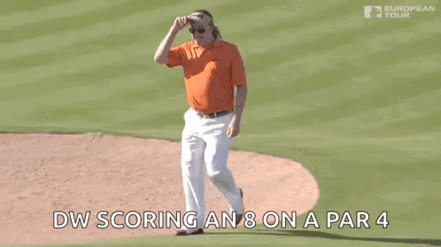 a man in an orange shirt and white pants is walking on a golf course and says dw scoring an 8 on a par 4