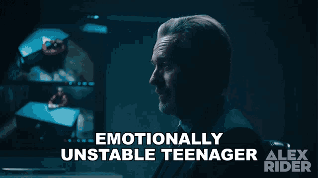 a man is sitting in front of a screen that says emotionally unstable teenager