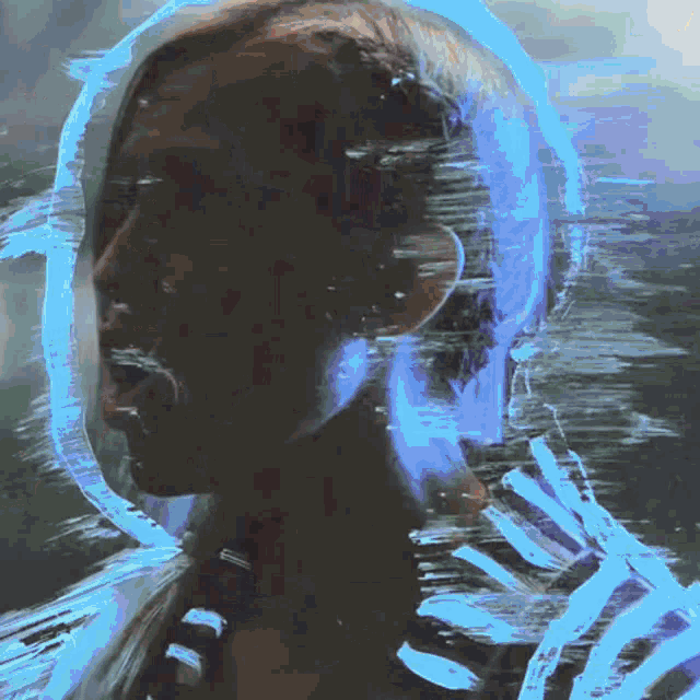 a painting of a person 's face with a blue brush stroke