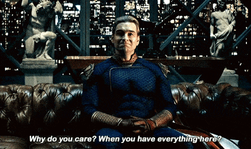 a man in a superhero costume is asking why do you care when you have everything here .