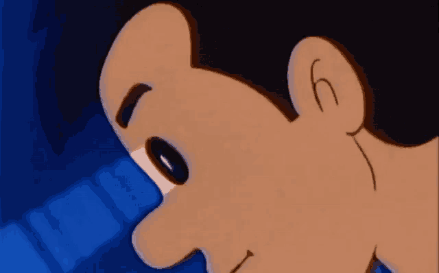 a close up of a cartoon character 's face with the letter h on the ear