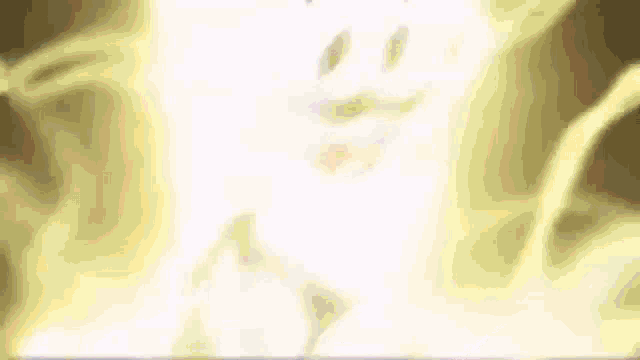 a blurred image of a person with a yellow background