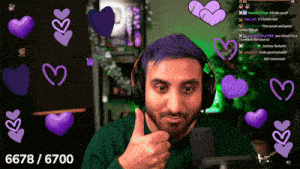 a man with purple hair giving a thumbs up in front of purple hearts