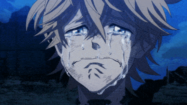 a close up of a person 's face with tears coming out of it