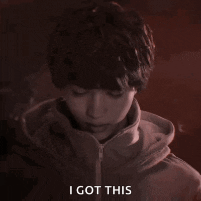 a close up of a person 's face with the words `` i got this '' written on the bottom .