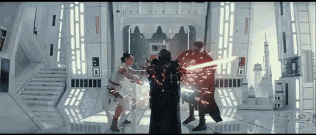darth vader and rey are fighting with lightsabers in a room