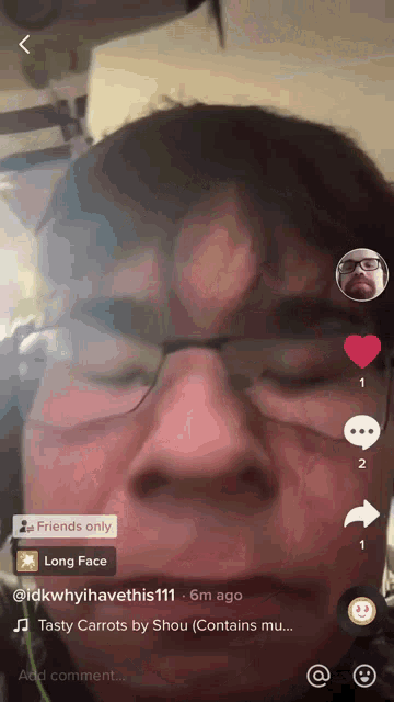 a man wearing glasses and headphones is talking on a tiktok video