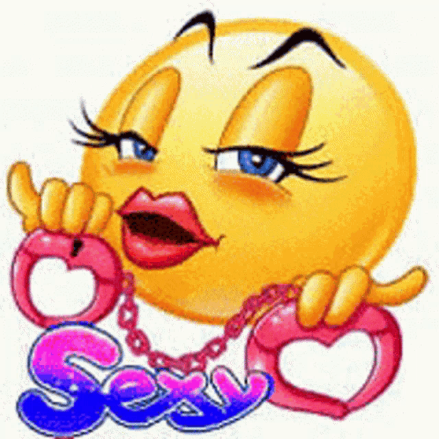 a female smiley face is wearing pink handcuffs and a necklace with the word sexy .