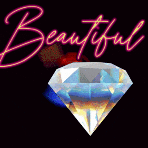 a neon sign that says beauty shine on with a diamond